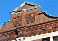Decorative false front to a building in the upper High Street, i.e. north of the Market Square.