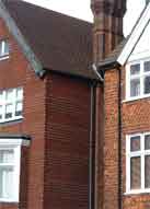 This heavy tiling style was obviously popular in the late 19th century. This example is in Widmore Road.